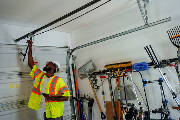 Professional Garage Door Panel Replacement technician working in Acushnet Center, MA